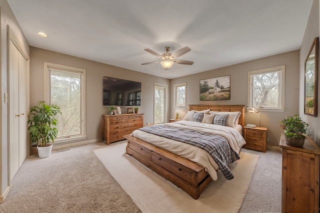 bedroom featuring baseboards, ceiling fan, recessed lighting, and light colored carpet