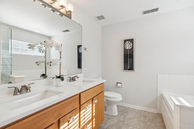 168 Willow Blvd, Willow Springs, IL 60480 - bathroom with a bath, double vanity, toilet, and baseboards