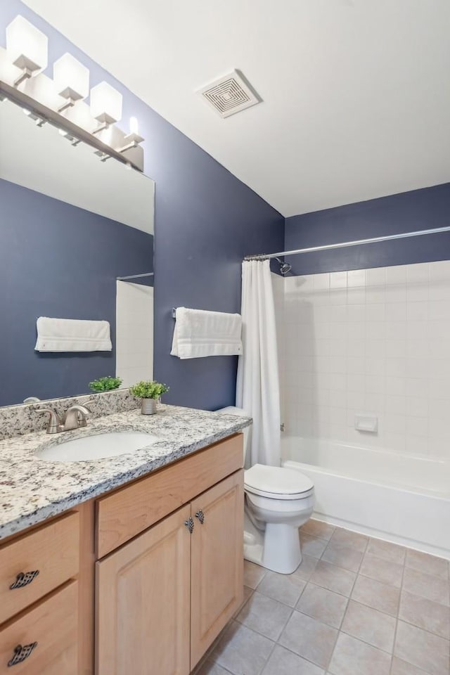 168 Willow Blvd, Willow Springs, IL 60480 - bathroom featuring toilet, tile patterned flooring, vanity, and shower / bath combo with shower curtain