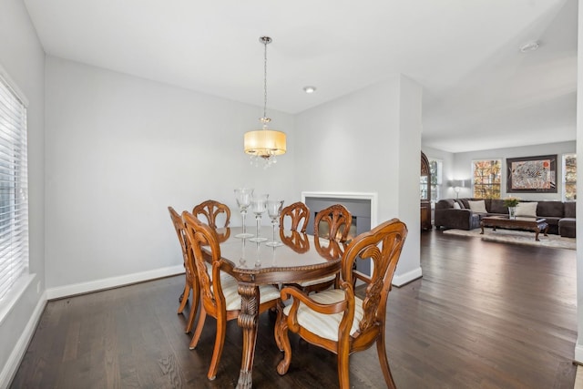 168 Willow Blvd, Willow Springs, IL 60480 - dining area with baseboards, dark wood finished floors, and a chandelier