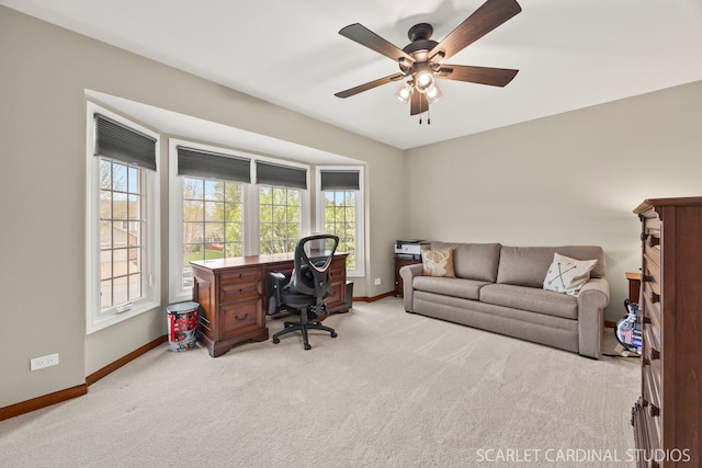carpeted office with plenty of natural light, baseboards, and ceiling fan
