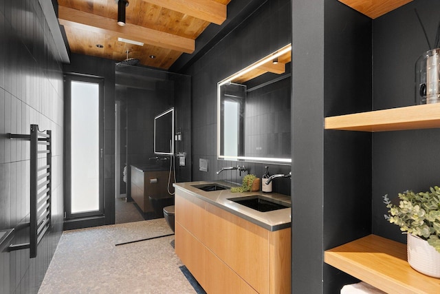 full bath with beam ceiling, walk in shower, double vanity, a towel warmer, and wood ceiling
