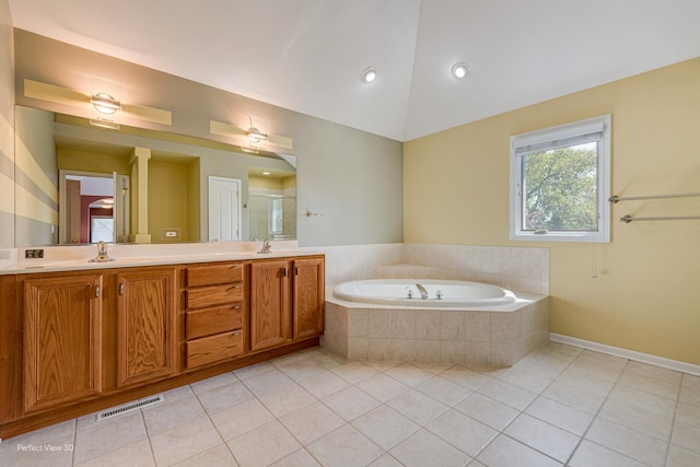 573 W Babcock Ave, Elmhurst, IL 60126 - full bath featuring tile patterned flooring, a garden tub, a stall shower, vaulted ceiling, and double vanity
