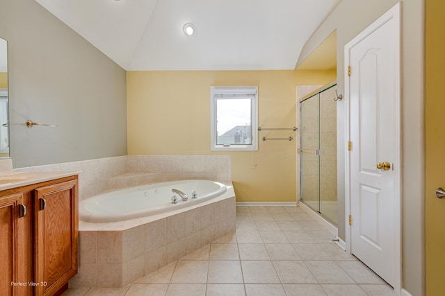 573 W Babcock Ave, Elmhurst, IL 60126 - full bath with a garden tub, a shower stall, vanity, vaulted ceiling, and tile patterned flooring