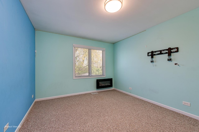 573 W Babcock Ave, Elmhurst, IL 60126 - carpeted empty room featuring baseboards