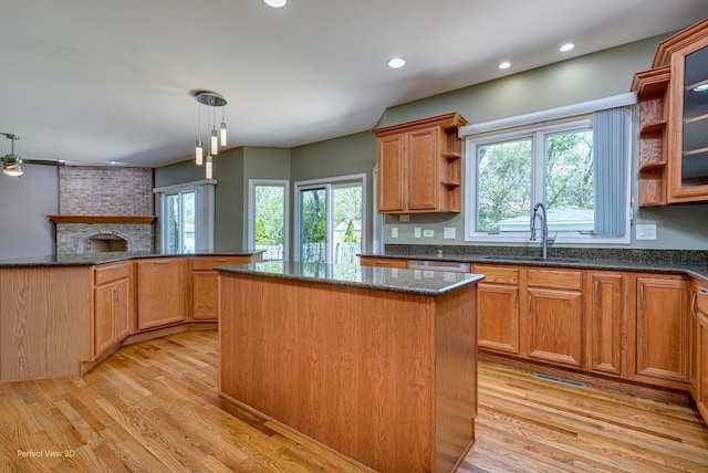 573 W Babcock Ave, Elmhurst, IL 60126 - kitchen featuring a sink, a kitchen island, open shelves, light wood-style floors, and recessed lighting