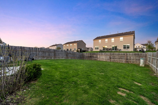 733 Florence St, Hampshire, IL 60140 - yard at dusk with a fenced backyard