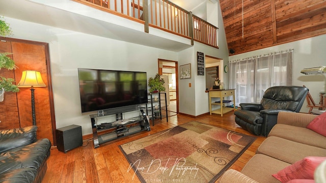 23233 W N Lakewood Ln, Lake Zurich, IL 60047 - living room with wood-type flooring, baseboards, and high vaulted ceiling