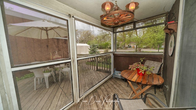 23233 W N Lakewood Ln, Lake Zurich, IL 60047 - sunroom featuring an inviting chandelier