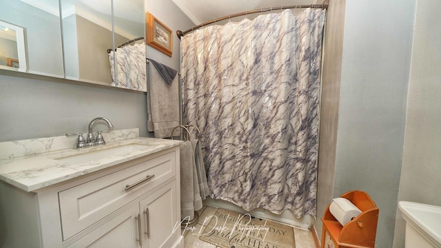 23233 W N Lakewood Ln, Lake Zurich, IL 60047 - bathroom featuring vanity, shower / bath combo with shower curtain, and toilet
