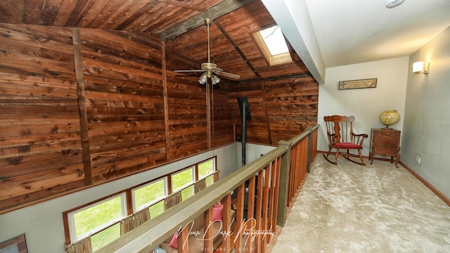 23233 W N Lakewood Ln, Lake Zurich, IL 60047 - hall with carpet floors, baseboards, vaulted ceiling with skylight, and wooden ceiling