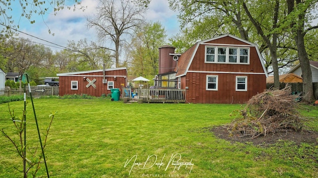 23233 W N Lakewood Ln, Lake Zurich, IL 60047 - view of yard featuring fence, an outdoor structure, and a deck