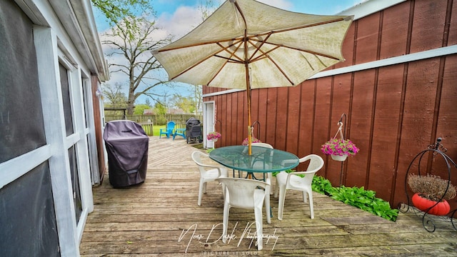 23233 W N Lakewood Ln, Lake Zurich, IL 60047 - deck with area for grilling, fence, and outdoor dining area