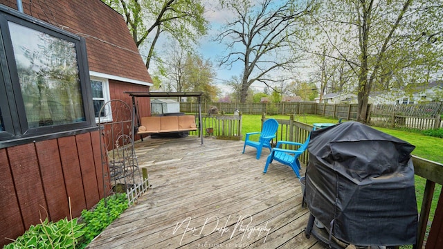 23233 W N Lakewood Ln, Lake Zurich, IL 60047 - wooden terrace featuring a lawn, a fenced backyard, and a grill