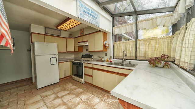 23233 W N Lakewood Ln, Lake Zurich, IL 60047 - kitchen with a sink, white appliances, light countertops, stone finish flooring, and under cabinet range hood