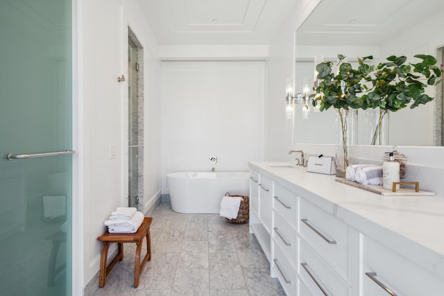full bath with a freestanding tub, vanity, a stall shower, and marble finish floor