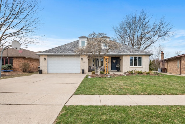 6932 Westview Dr, Oak Forest, IL 60452 - view of front facade with brick siding, driveway, a front yard, and a garage