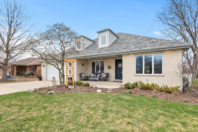6932 Westview Dr, Oak Forest, IL 60452 - cape cod home featuring an attached garage, concrete driveway, a front lawn, and brick siding