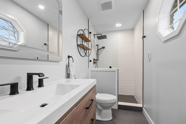 6932 Westview Dr, Oak Forest, IL 60452 - bathroom with a walk in shower, tile patterned floors, vanity, and toilet