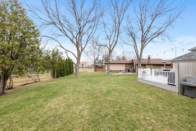 6932 Westview Dr, Oak Forest, IL 60452 - view of yard featuring a deck