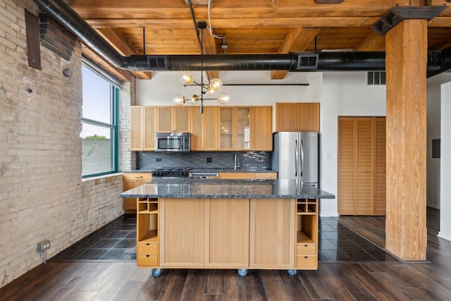 kitchen with open shelves, appliances with stainless steel finishes, a high ceiling, brick wall, and wood ceiling