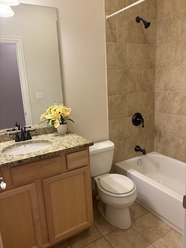 bathroom with toilet, tile patterned floors, bathtub / shower combination, and vanity