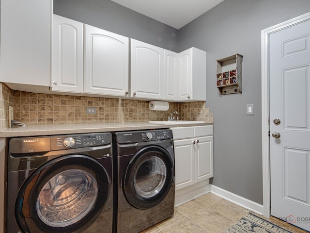 1341 N Home Ct, Palatine, IL 60074 - laundry room with washing machine and clothes dryer, cabinet space, baseboards, and light tile patterned floors