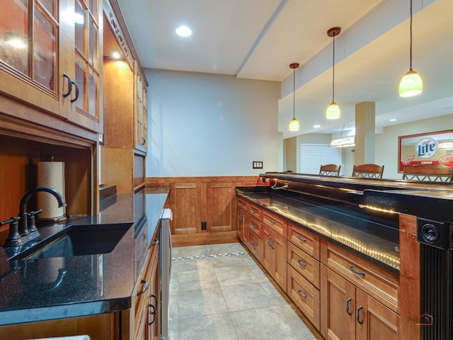 1341 N Home Ct, Palatine, IL 60074 - kitchen with a sink, brown cabinetry, wainscoting, pendant lighting, and recessed lighting