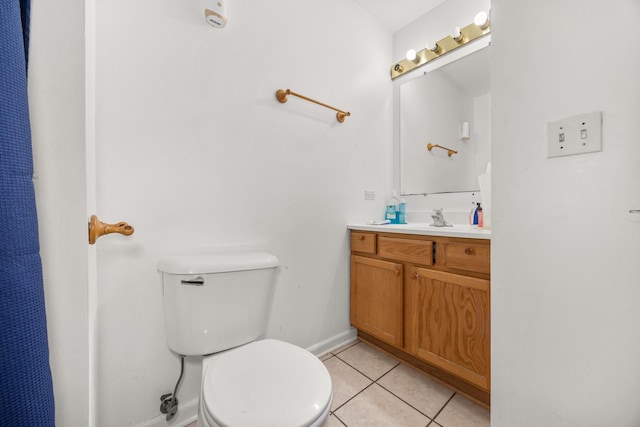 4221 Brentwood Ln, Waukegan, IL 60087 - bathroom with toilet, baseboards, tile patterned flooring, and vanity