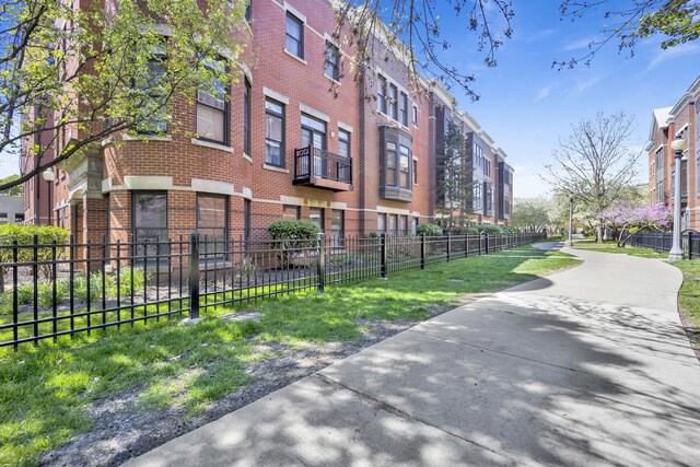 surrounding community featuring fence private yard