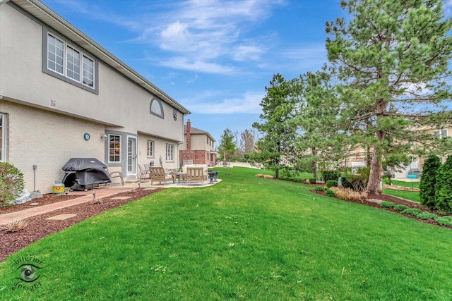 view of yard with a patio