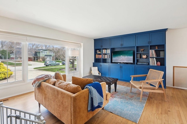 4569 Gettysburg Dr, Rolling Meadows, IL 60008 - living area featuring plenty of natural light and wood finished floors