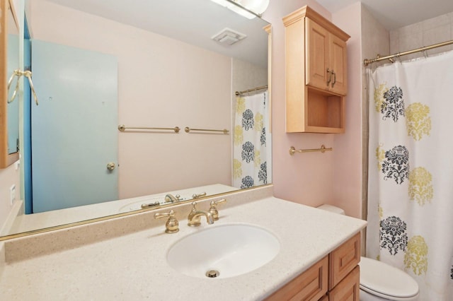 4569 Gettysburg Dr, Rolling Meadows, IL 60008 - bathroom featuring toilet, visible vents, a shower with shower curtain, and vanity