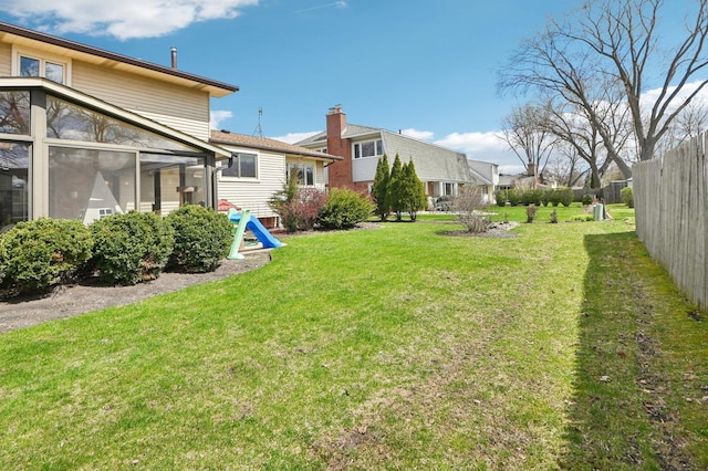 4569 Gettysburg Dr, Rolling Meadows, IL 60008 - view of yard with fence and a sunroom