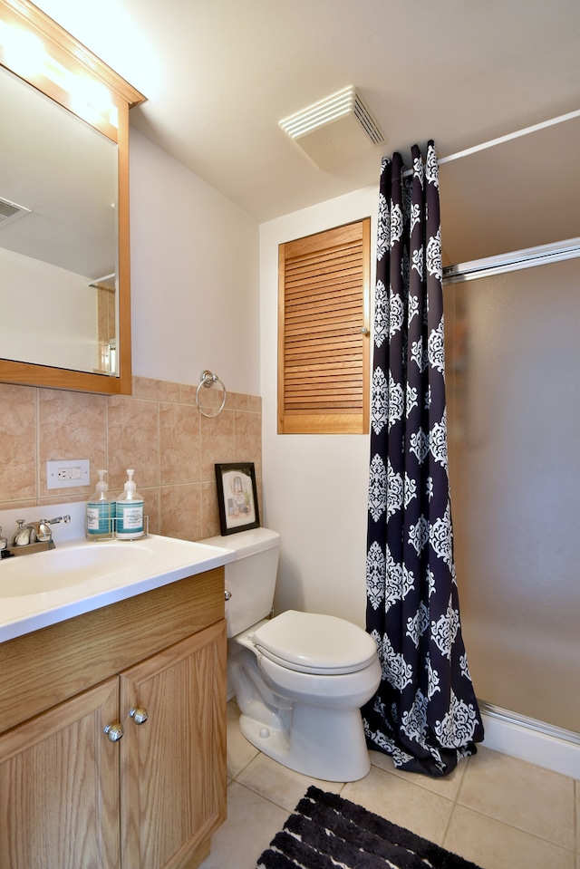 1923 Windward Ln Unit 1923, Hanover Park, IL 60133 - full bath featuring vanity, visible vents, toilet, a shower with shower curtain, and tile patterned floors