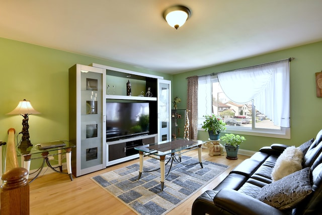 1923 Windward Ln Unit 1923, Hanover Park, IL 60133 - living area with baseboards and light wood-style flooring