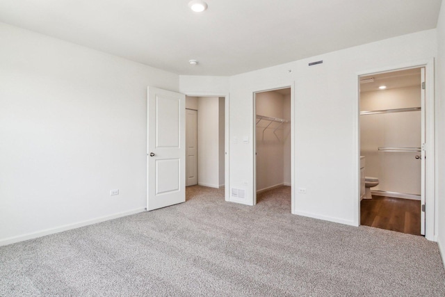 6343 Ulster Dr, Tinley Park, IL 60477 - unfurnished bedroom featuring recessed lighting, baseboards, a spacious closet, and carpet