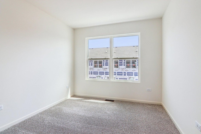 6343 Ulster Dr, Tinley Park, IL 60477 - unfurnished room featuring visible vents, carpet, and baseboards