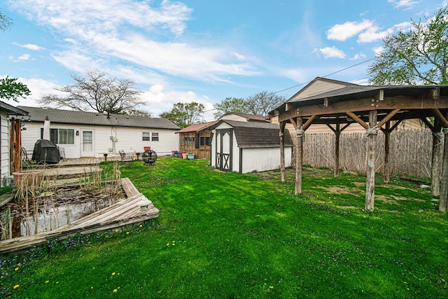 19605 Redwood Ln, Mokena, IL 60448 - view of yard with an outbuilding, fence, and a shed