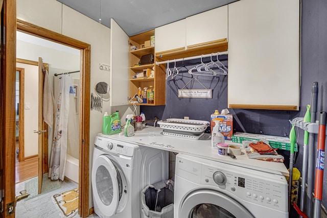 19605 Redwood Ln, Mokena, IL 60448 - laundry area featuring cabinet space and washer and clothes dryer