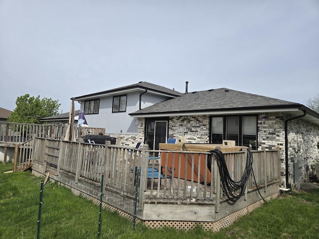 8919 Meadowview Dr, Orland Hills, IL 60487 - rear view of house featuring a lawn, a shingled roof, a hot tub, and a deck