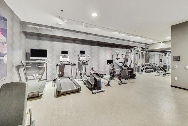 exercise room with rail lighting