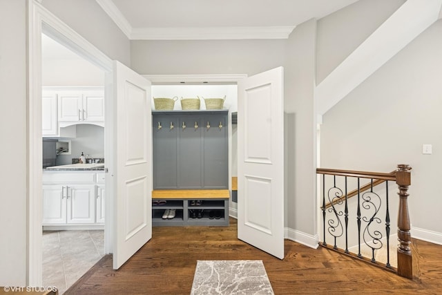 410 W 2nd St, Elmhurst, IL 60126 - mudroom featuring crown molding, baseboards, and wood finished floors