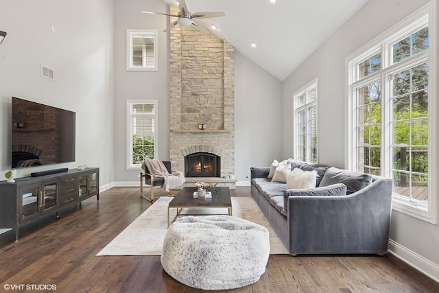 410 W 2nd St, Elmhurst, IL 60126 - living room with high vaulted ceiling, visible vents, a healthy amount of sunlight, and a fireplace