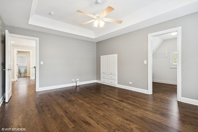410 W 2nd St, Elmhurst, IL 60126 - unfurnished room with dark wood finished floors, ceiling fan, and a tray ceiling