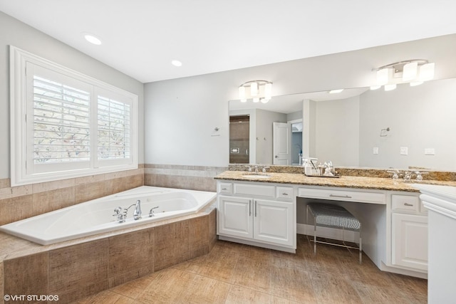 410 W 2nd St, Elmhurst, IL 60126 - bathroom featuring double vanity, a shower stall, a sink, and a bath