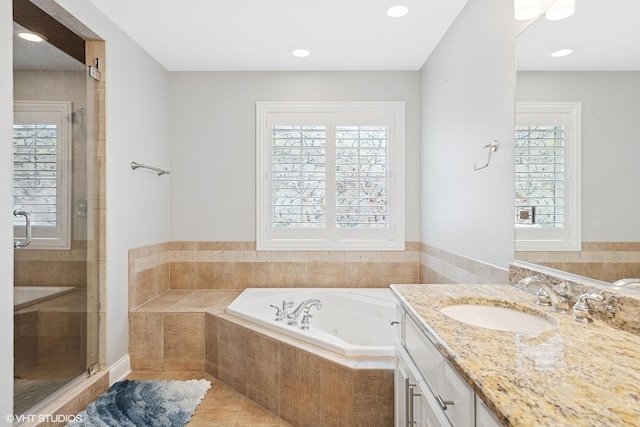 410 W 2nd St, Elmhurst, IL 60126 - full bathroom featuring plenty of natural light, a stall shower, a tub with jets, and vanity