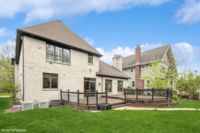 410 W 2nd St, Elmhurst, IL 60126 - rear view of house featuring a yard, brick siding, a shingled roof, and a wooden deck