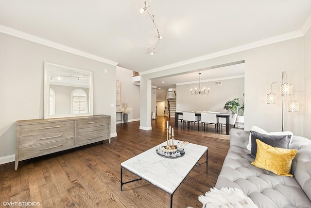 410 W 2nd St, Elmhurst, IL 60126 - living area with rail lighting, dark wood-style floors, ornamental molding, and baseboards
