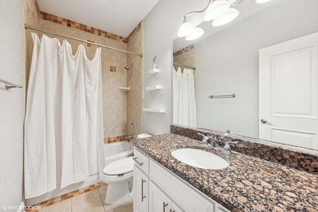410 W 2nd St, Elmhurst, IL 60126 - full bath featuring tile patterned flooring, shower / bathtub combination with curtain, toilet, and vanity